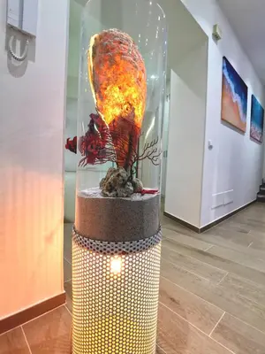 a fish in a glass jar in a room at Betta splendens in Palermo