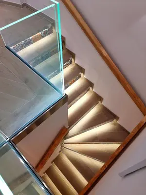 a spiral staircase with a glass case on it at Betta splendens in Palermo