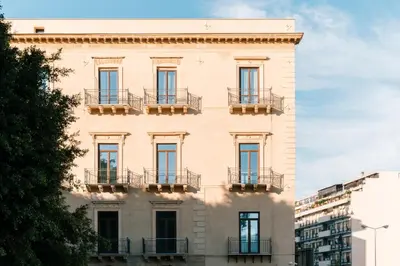 a facade of a building with balconies at Boutique BnB Dolcevita in Palermo