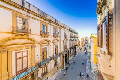 an overhead view of a city street with buildings at Palazzo Ardizzone in Palermo