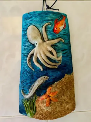 a cake with an octopus and a fish at Monfenera Apartment 2 in Palermo