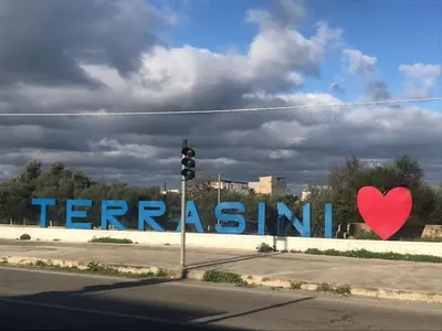 a sign that says ferris island with a red heart at NONNA MARIA Apt 1 or Apt 2 in Terrasini