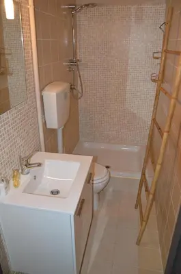 a bathroom with a sink and a toilet and a shower at B&B Abbacò in Palermo