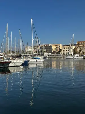 a group of boats are docked in a harbor at Abside Suite & Spa in Palermo