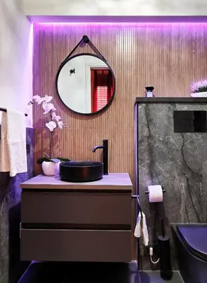 a bathroom with a sink and a mirror at Guastella House in Palermo