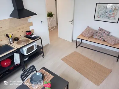 a living room with a couch and a table at Sea view life in Carini
