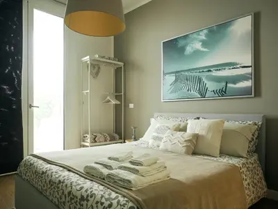 a bedroom with a bed with towels on it at Sea view life in Carini