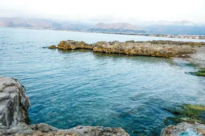 an island in the middle of a body of water at Airport sicily home palermo in Carini