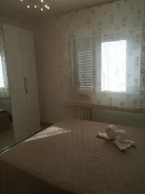 a bedroom with a bed with a towel on it at Casetta 