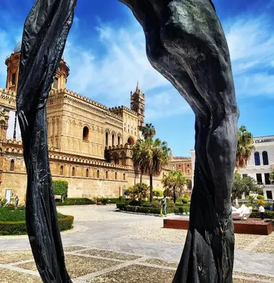 a sculpture in front of a building at Suite Cathedral Palermo in Palermo