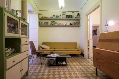 a living room with a couch and a table at Casa Particular Luxury in Palermo