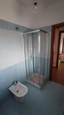 a bathroom with a shower and a sink at La Casetta della Musica in Mondello