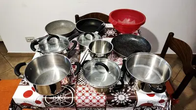 a bunch of pots and pans on a table at La Casetta della Musica in Mondello
