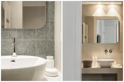 a bathroom with a white sink and a mirror at Le Niche Holiday Homes by Wonderful Italy in Palermo