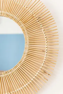 a wooden wicker shelf with a mirror at VENTO DI SCIROCCO CASA VACANZE A POCHI METRI DAL MARE in Santa Flavia