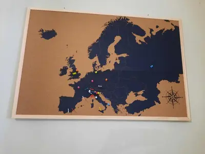 a map of europe is hanging on a wall at La terrazza sul vicolo in Palermo