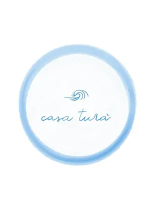 a white circle with a wave on it at Casa Turà in Isola delle Femmine