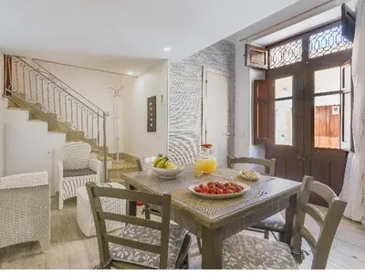 a table with fruit on it in a room at Casa vacanza Terra Mare in Castellammare del Golfo