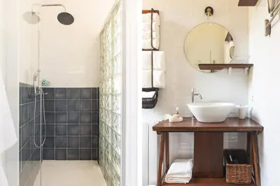 a bathroom with a sink and a shower at Casa Villea in Trabia