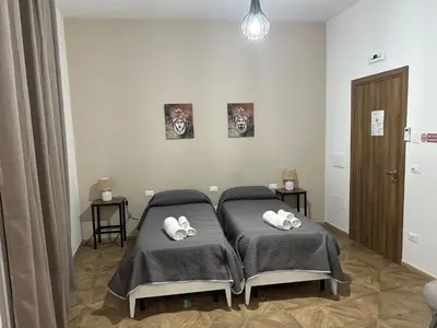 a hospital room with a bed with towels on it at DREAM CORLEONE ONE in Corleone