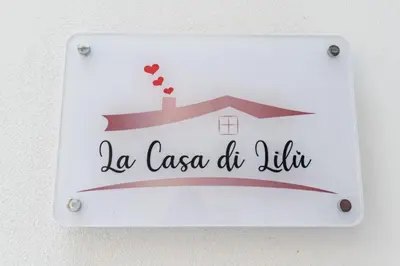 a light switch with the words la casa de lilith at La Casa di Lilù in Palermo