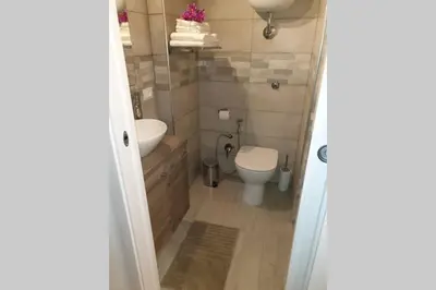 a small bathroom with a toilet and a sink at Appartamento VITTORIA in Palermo