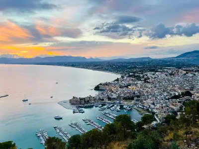 an aerial view of a harbor with boats in the water at Curina Luxury Villa - Panoramic Pool Villa near Scopello in Castellammare del Golfo
