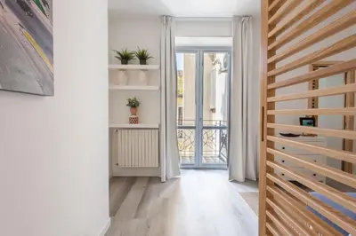 a hallway with a door leading to a balcony at Loft Trinacria con Vista Mare by Wonderful Italy in Palermo