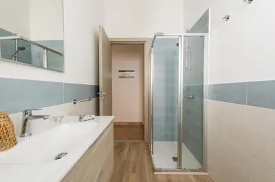 a bathroom with a shower and a sink at Vento di Grecale - a pochi metri dal mare in Santa Flavia