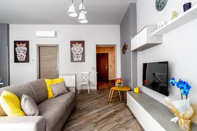 a living room with a couch and a tv at Dream Home in Palermo