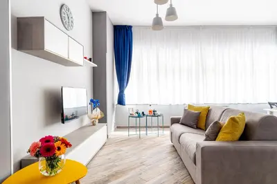 a living room with a couch and a table at Dream Home in Palermo