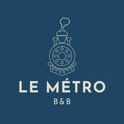 a logo for a railway station with a train at Le Métro in Carini
