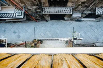 an overhead view of a building under construction at Calamarina Centro in Palermo