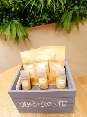 a box of honey and cheese on a table at Diatomea in Palermo