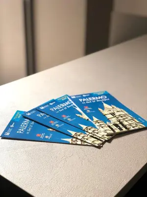 a group of pamphlets sitting on top of a table at B&B Angolo83 Palermo centro in Palermo