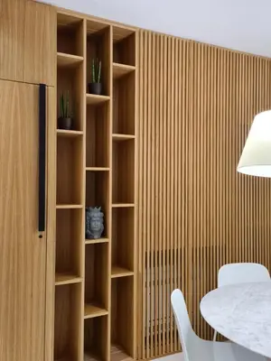 a room with wooden shelves and a table at Dc Domus Charme SPA in Palermo