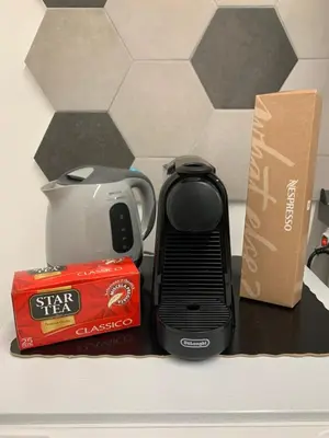 a toaster and a box sitting on a counter at Kemonia Home Palermo in Palermo
