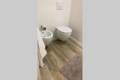 a bathroom with a toilet and a bidet at Delle Palme Rooms elegante monolocale in centro in Palermo