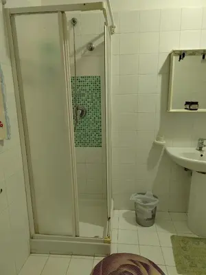 a bathroom with a shower and a sink at Casa vacanze BY THE SEA in Trabia