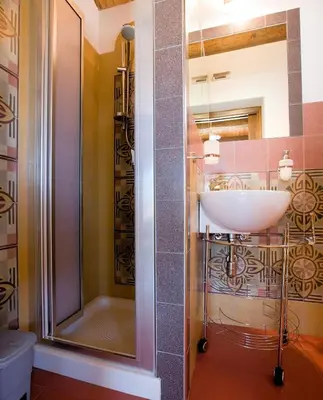 a bathroom with a sink and a shower at Sicilia Ovest - Sea View Terrace Sofia in Castellammare del Golfo