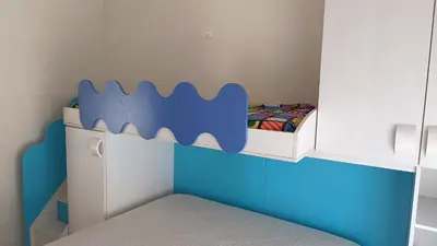 a childs bedroom with a shark bunk bed at casa francesca 2 LOFTY in Castellammare del Golfo