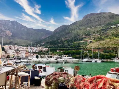a group of boats docked in a harbor with mountains at Holiday Home Melograno di Patrizia by Interhome in Castellammare del Golfo