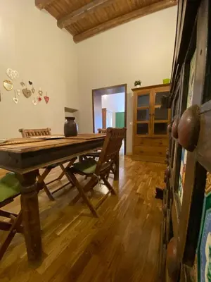 a living room with a ping pong table in it at Casa Vetriera in Palermo