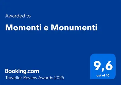 a blue sign with the words momentum and momentum at Momenti e Monumenti in Palermo