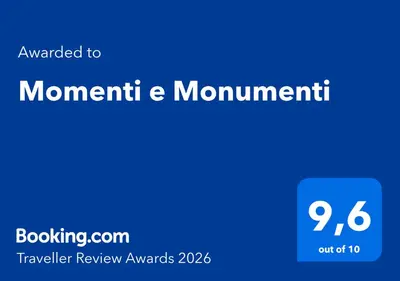 a blue sign with the words momentum and momentum at Momenti e Monumenti in Palermo