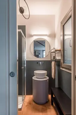 a bedroom with a sliding glass door with a bed at Casa con Giardino all'ex Fabbrica di Pomodoro by Wonderful Italy in Palermo