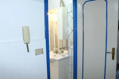 a bathroom with a sink and a mirror at Dolce Casa in Palermo