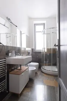 a bathroom with a sink and a shower and a toilet at Rome 118 in Palermo