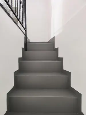 a set of stairs with a metal railing at A NICAREDDA in Palermo