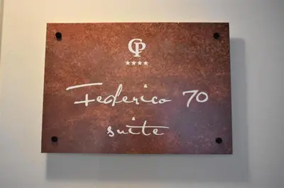 a sign that says welcome to latvia on a wall at Federico 70 Smeraldo in Palermo